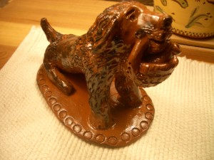 redware dog with basket